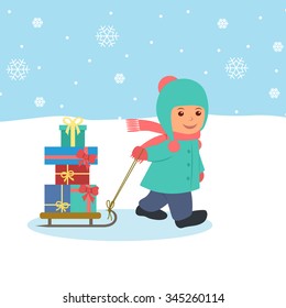 The boy pulls a sled with gifts