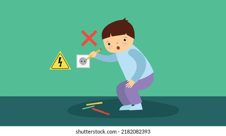 the boy puts the pencil in the socket