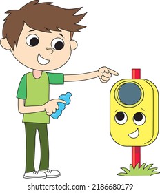 boy puts the plastic bottle in the waste container