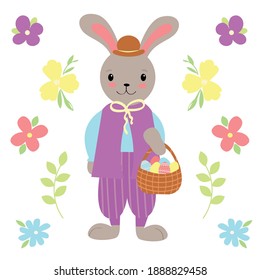 A boy rabbit in clothes and a hat holds a basket with colorful Easter eggs.