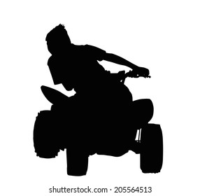 Boy Racing on Quad Bike Through Corner Silhouette