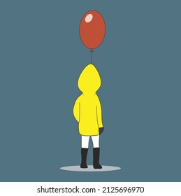 Boy with raincoat and brings a balloon on his left hand