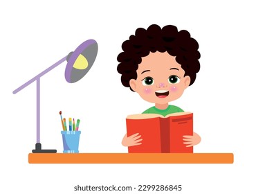 A boy is reading a book on a desk.