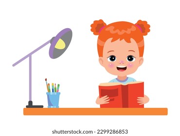 Un niño está leyendo un libro en un escritorio.