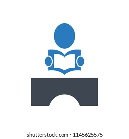 Boy is reading books on the table icon vector blue