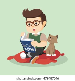 boy reading while cat watching colorful