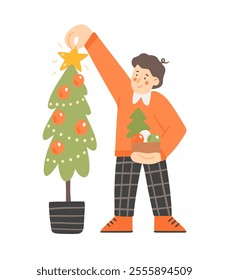 Boy in red sweater decorate a Christmas tree. Cute flat vector illustration in cartoon style.Template for New Year or Christmas greeting card.