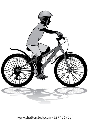A boy rides a bicycle on a walk.