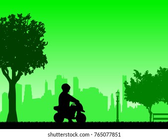 Boy rides on a motorcycle toy in park, one in the series of similar images silhouette