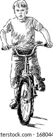 boy riding a bike