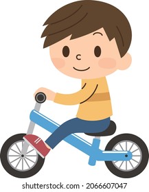 Boy riding a kick bike without a helmet