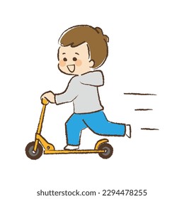 A boy riding a kickboard.