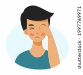 Boy rubs his face with his hand. Conjunctivitis in child. Inflammation and injury of eye. Tearfulness. Symptom of  eye disease.