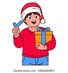 A Boy in a Santa hat holding a Christmas gift