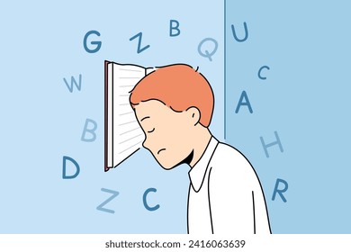 Boy with school textbook, tired due to grueling lessons and difficult homework, stands with head resting on book. Primary school student needs rest to avoid overexertion and depression.