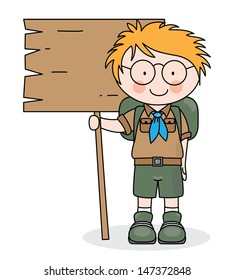 boy scout holding a wooden board. Space for text