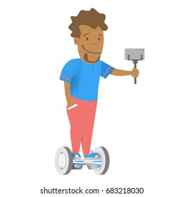 A boy with a selfie stick and smartphone.