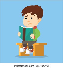 Boy serious reading book