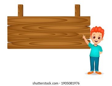 boy showing index finger to a blank wooden board 