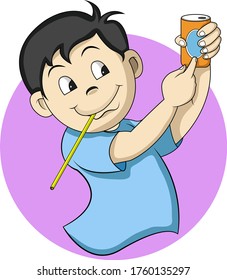 a boy shows his drink can