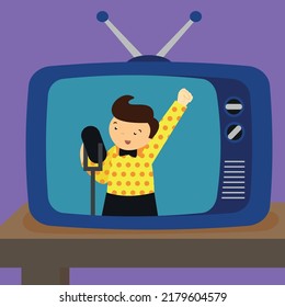 The boy sings into the microphone on the old TV