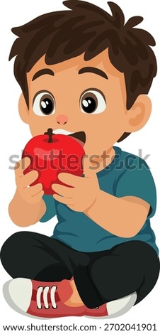 boy sit on the floor eating apple