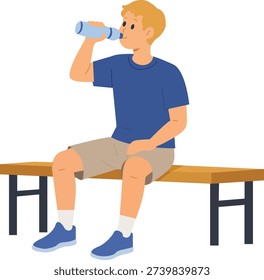 Boy sits on bench while drinking water to stay hydrated after playing sports at a park on a sunny day in the afternoon