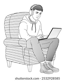 boy sitting in a chair with a laptop on her lap