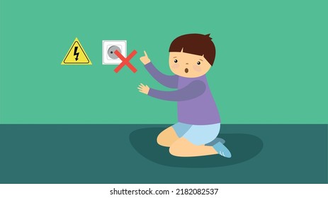 boy sitting near the socket