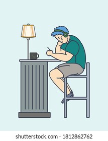Un niño está sentado en el bar de la sala escuchando música y usando un smartphone en cafetera