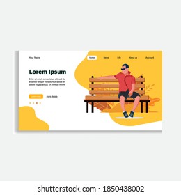 A boy sitting on the bench feeling on the beautiful place. Vector flat illustration. Landing page template, cartoon style.