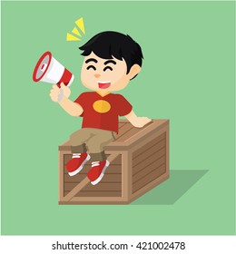 Boy sitting on crate box