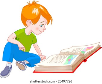 boy  sitting on floor and reading a book