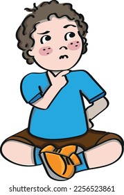 Boy sitting on the floor thinking
