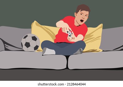 boy sitting on sofa and playing the video game with hold the joystick in front look.