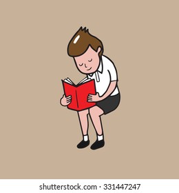 Boy sitting and reading book
