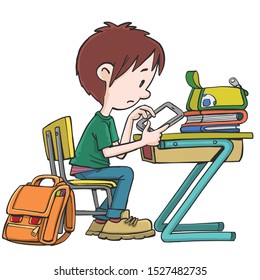 boy sitting in a school bench trying to use a cellphone