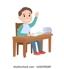 The boy sitting at the school desk pulls his hand up. A happy child at a school lesson, a funny cartoon character.
