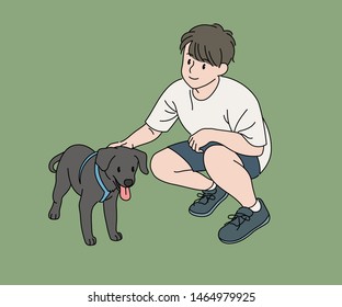 A boy is sitting and stroking a cute puppy. hand drawn style vector design illustrations. 