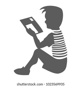 Boy sitting with tablet silhouette. Vector illustration.