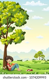 Boy is sitting unter a tree and reading a book