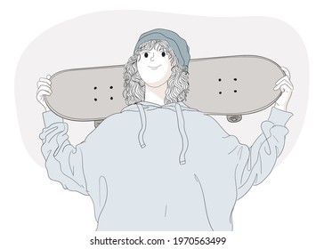 A boy with a skateboard in the outdoors