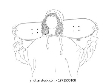 A boy with a skateboard in the outdoors