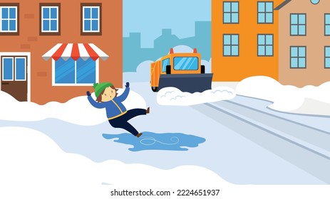 The boy slipped and falls on the ice in the city