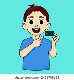 Boy smiling while holding and pointing to plastic bank card