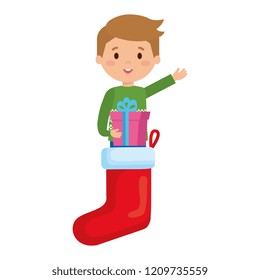 boy in socks with winter clothes and gift
