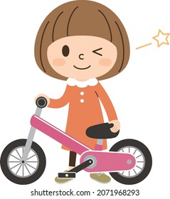 Boy standing with a bicycle