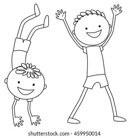 Boy standing on hands. Boy keeping his hands up.
