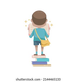 boy standing and reading a book