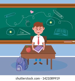 boy student with apple fruit and book in the desk